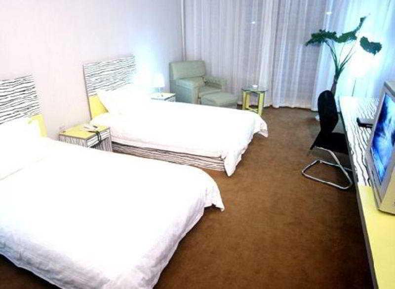 The Land Hotel Xangai Quarto foto